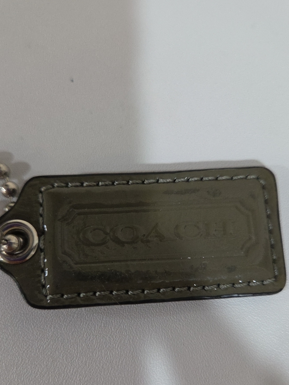 Coach Olive Green Patent Leather Bag Tag with Silver Hardware